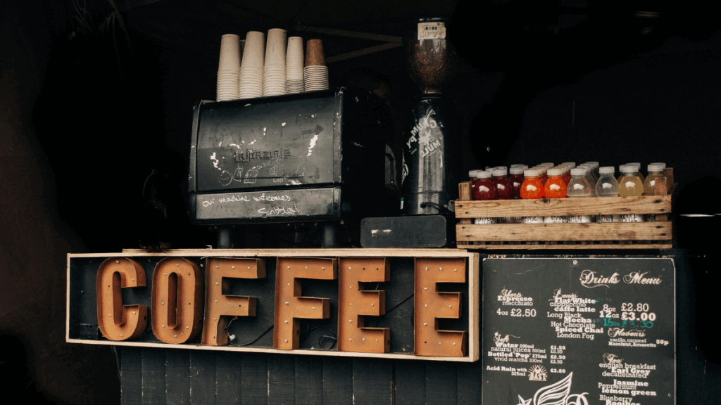 Barista preparing organic coffee in a zero-waste sustainable coffee shop in the United States